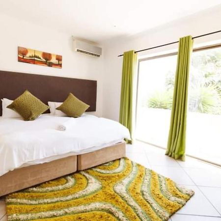Me Casa Guest House Bluewater Bay ภายนอก รูปภาพ